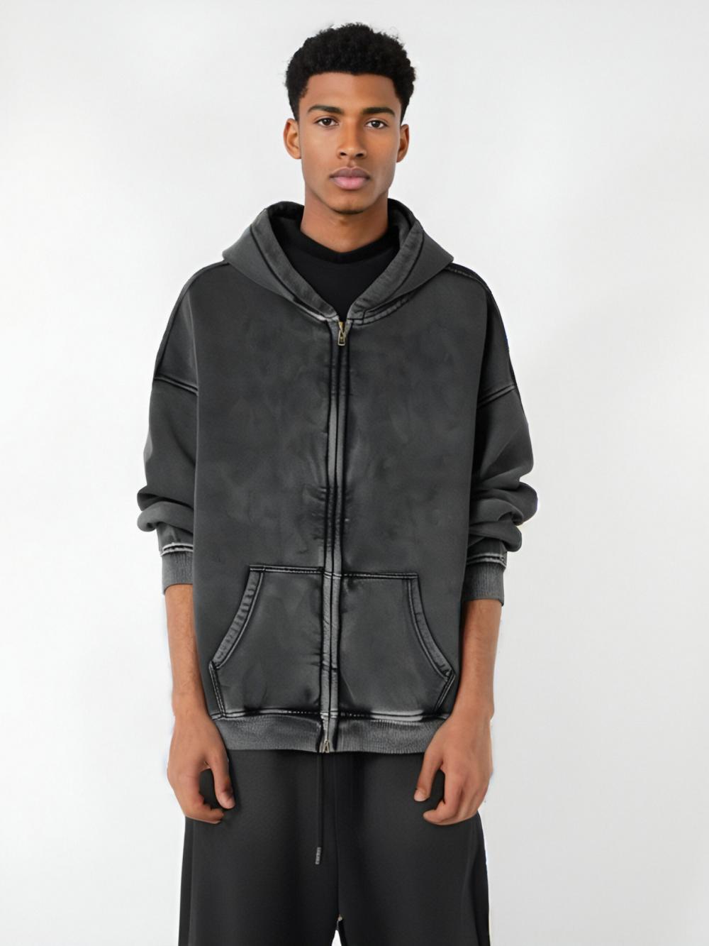 Black acid-wash full-zip hoodie with hood and front pockets on model