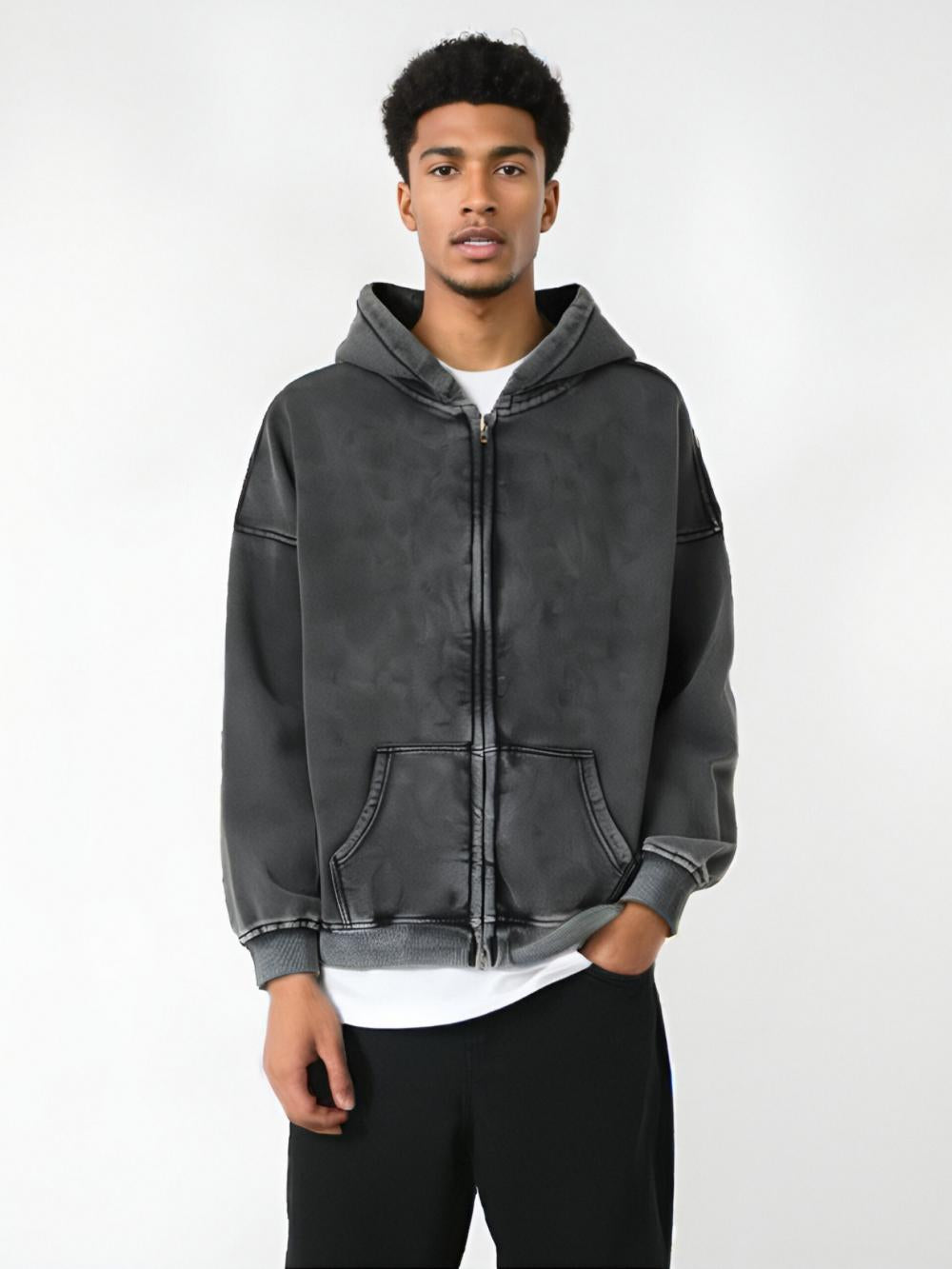 Black acid-wash full-zip hoodie with hood and front pockets, angled view