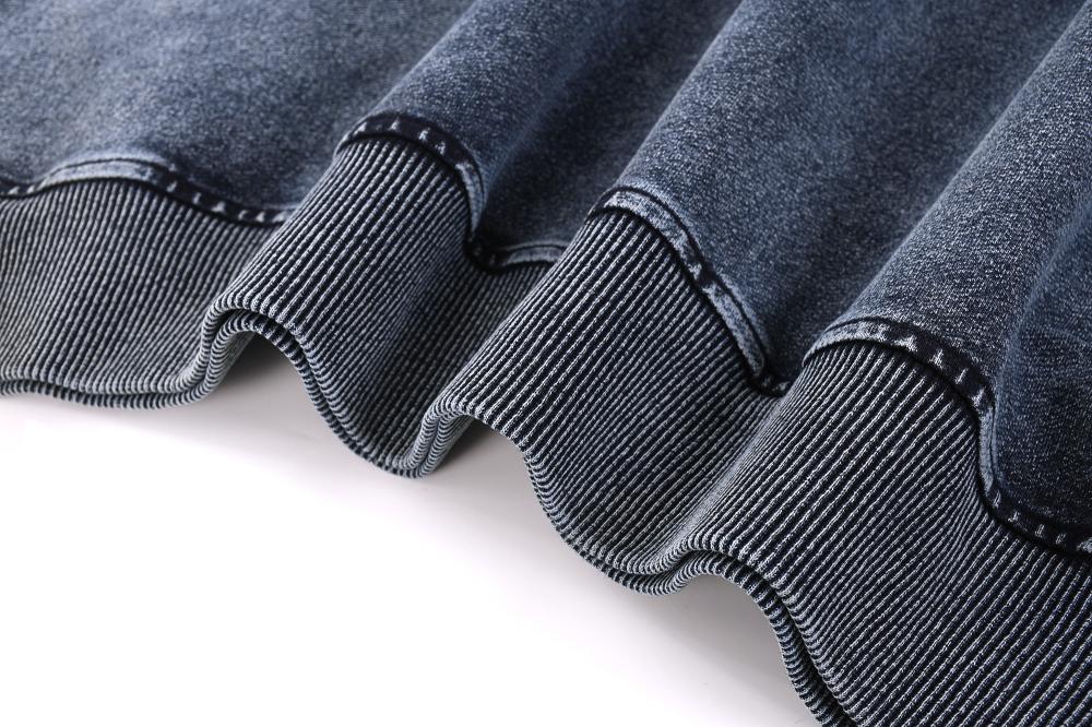 Ribbed sleeve cuffs and acid-wash body hem on oversized crewneck sweatshirt