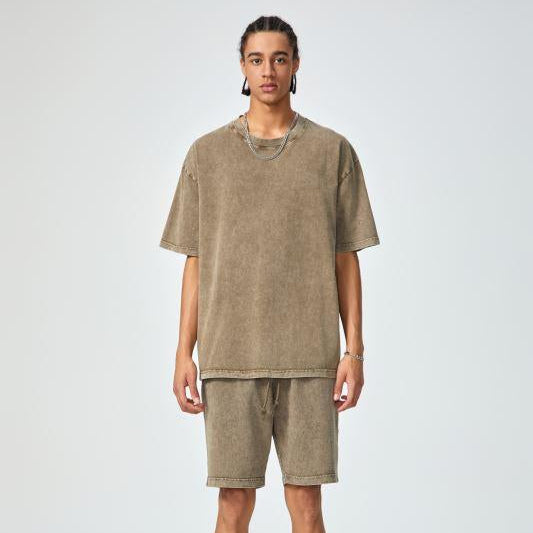 Unisex heavyweight oversized snow-wash T-shirt on model, beige khaki